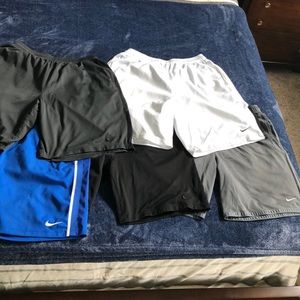 Nike. Mesh shorts. All are size XL. Mix and match for $9 each.